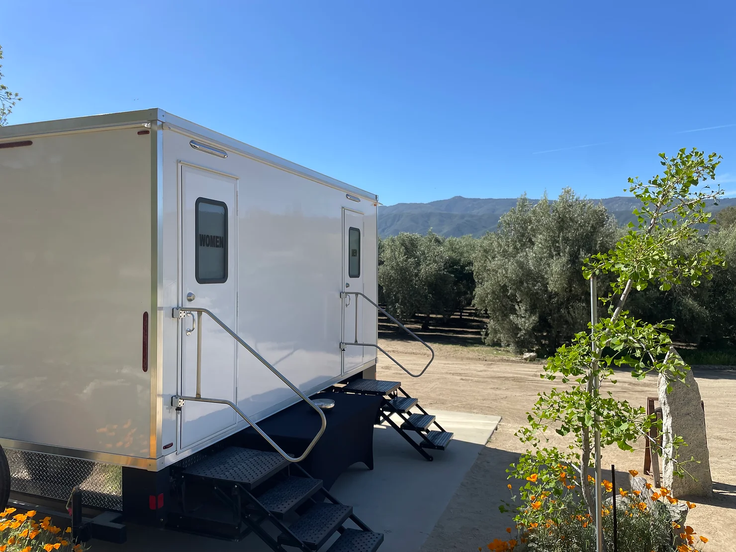 VIP Rentals portable restroom trailer set up at a wedding event in Southern California.
