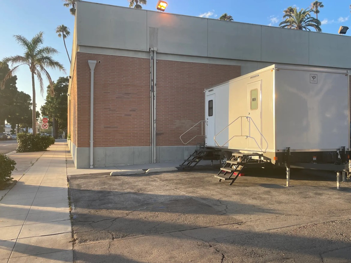 Bathroom Remodel West Coast Recovery Oceanside2 Luxury restroom trailer outside of Oceanside, California building during a bathroom renovation.