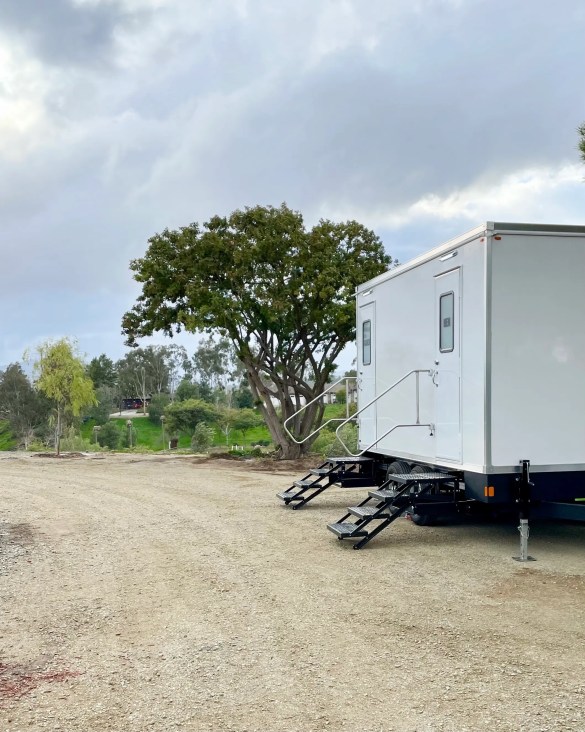 VIP Rentals, LLC bathroom trailer rentals parked at a bridal event in Temecula, California.