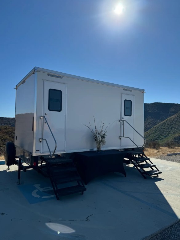 Luxury restroom trailer from VIP Rentals, LLC set up at an outdoor event in Malibu, California.