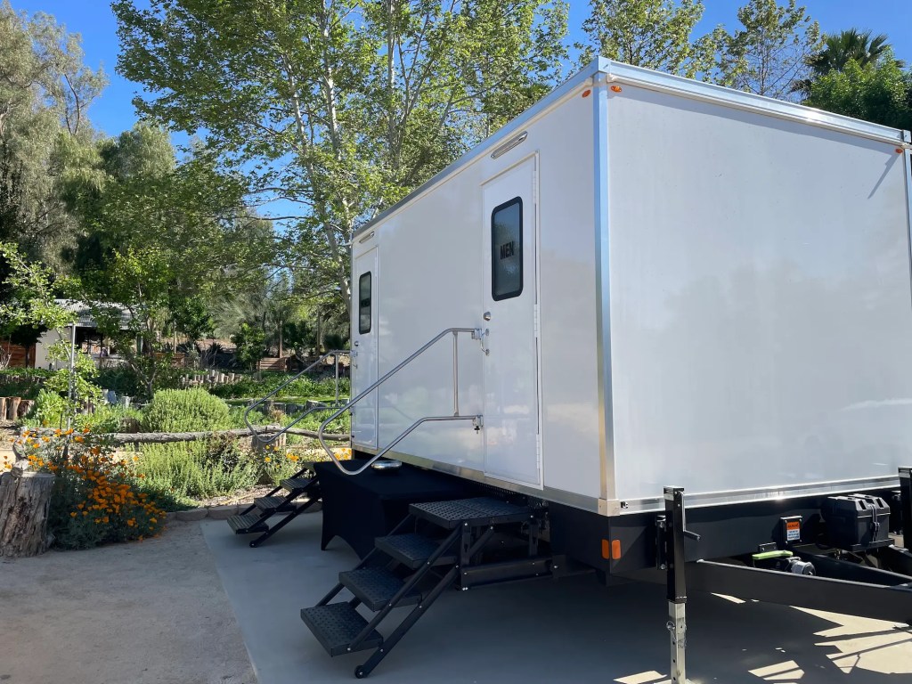 Multi-station luxury bathroom trailer parked at a private event in Temecula, California.