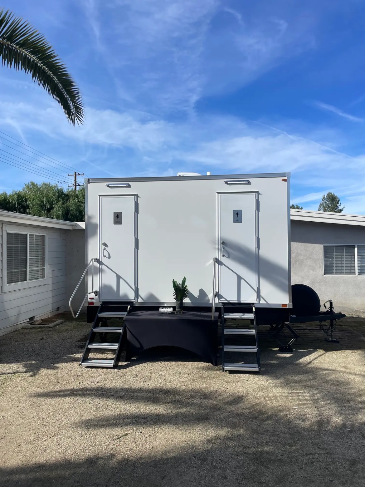 4-station restroom trailer parked outdoors for a birthday party in Hemet, CA.